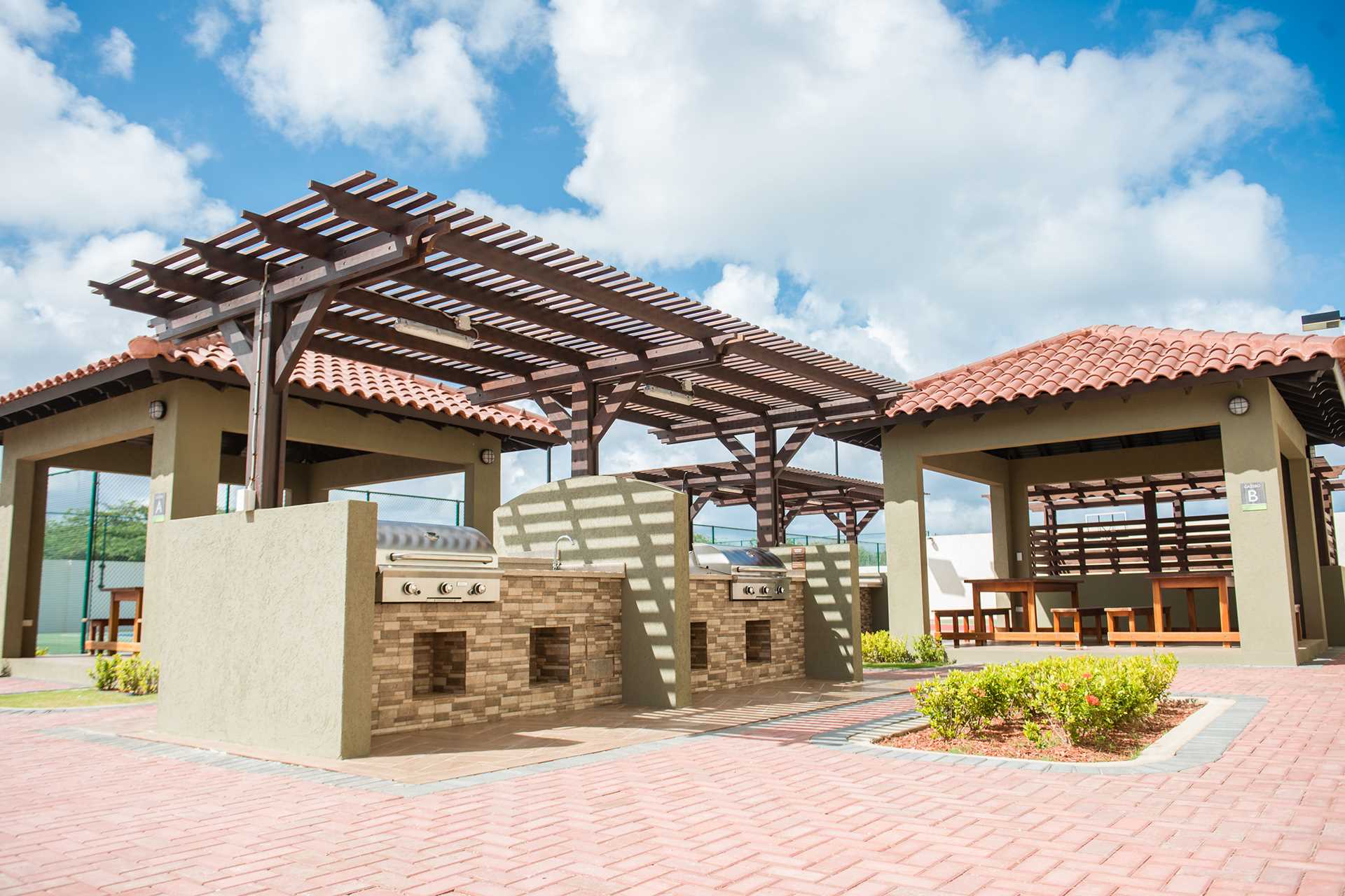 BBQ-grill area with picnic tables, perfect for your family a