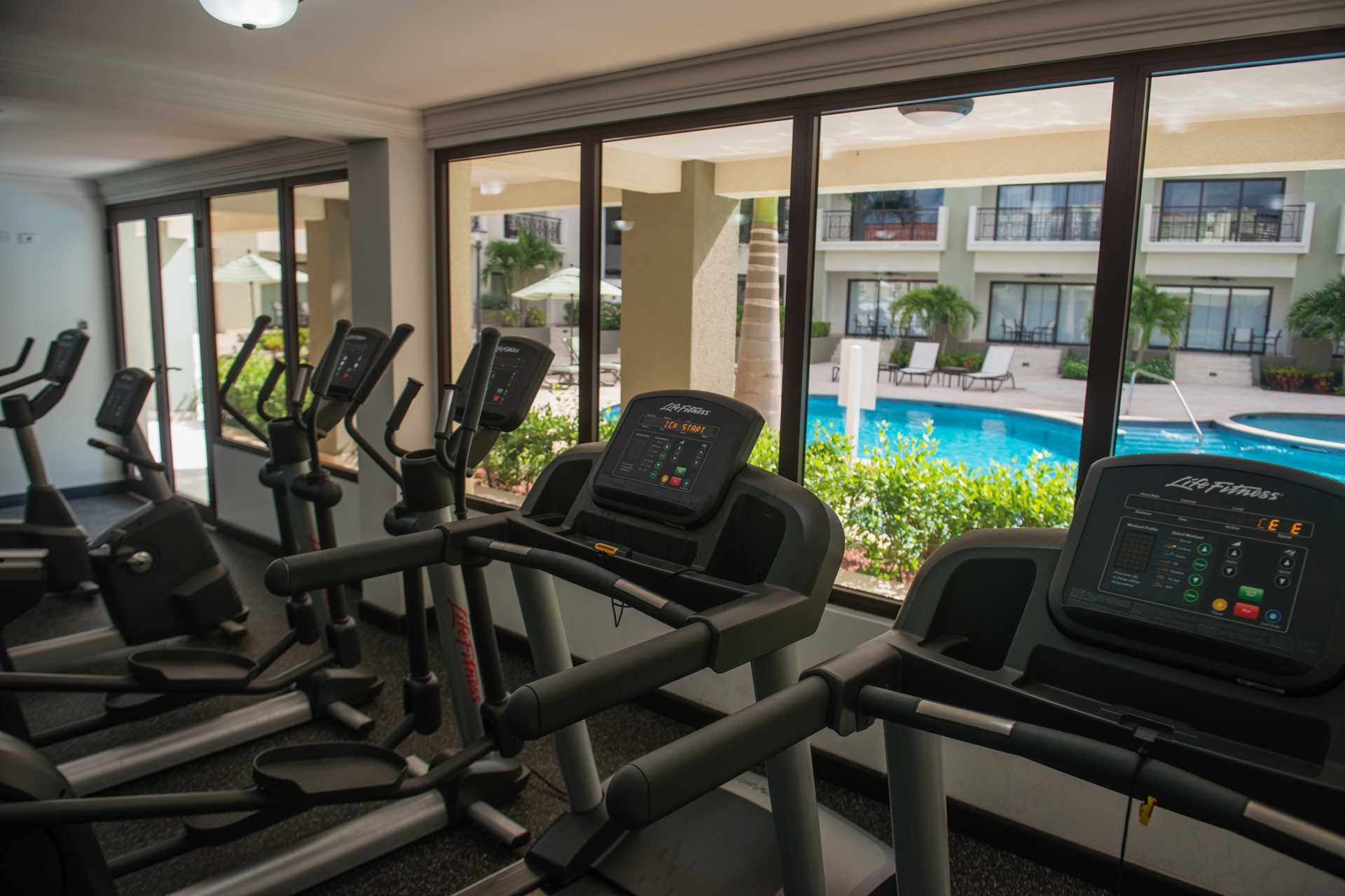 Fitness Center overlooking the pool area