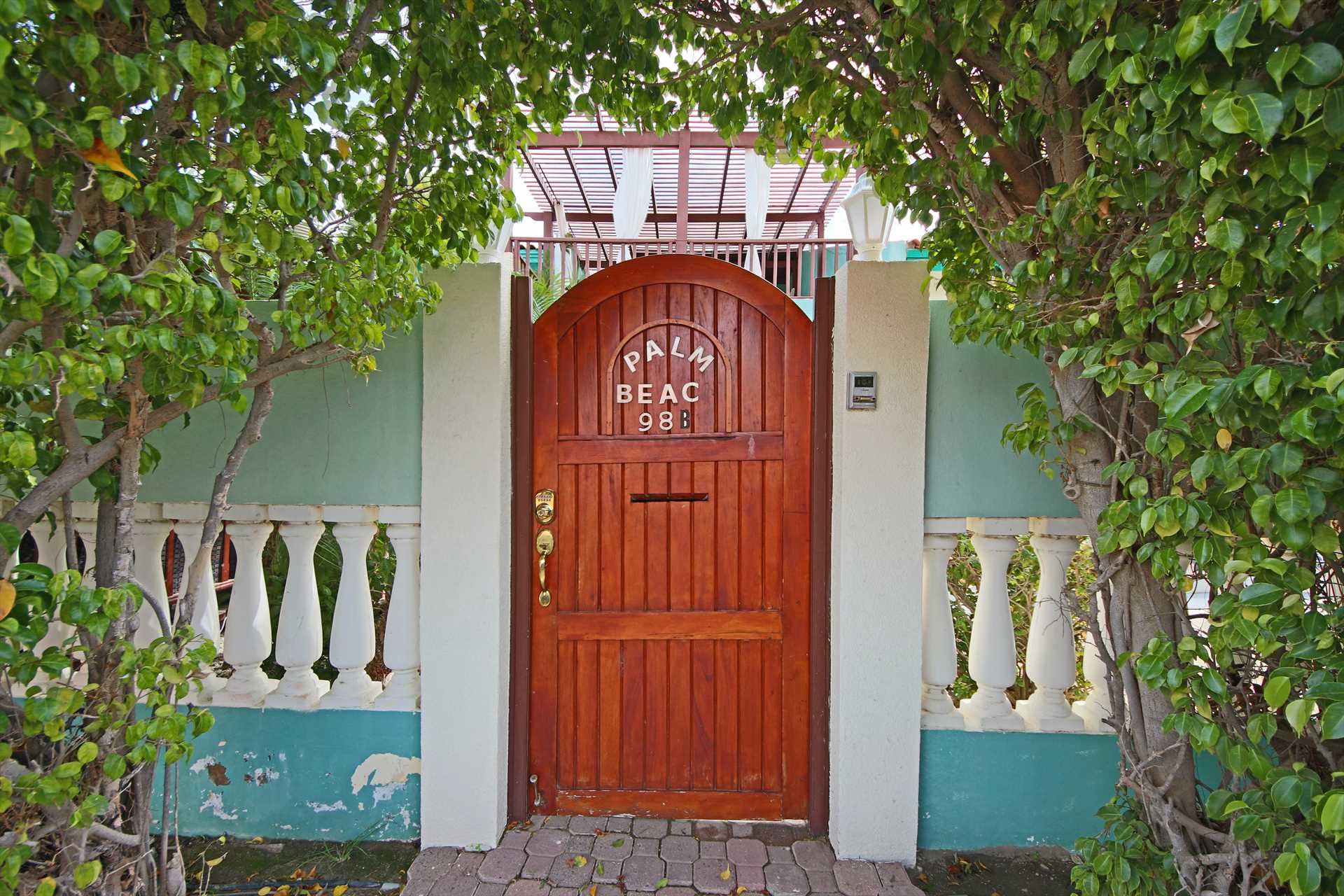 The Palm Beach Fortress front gate