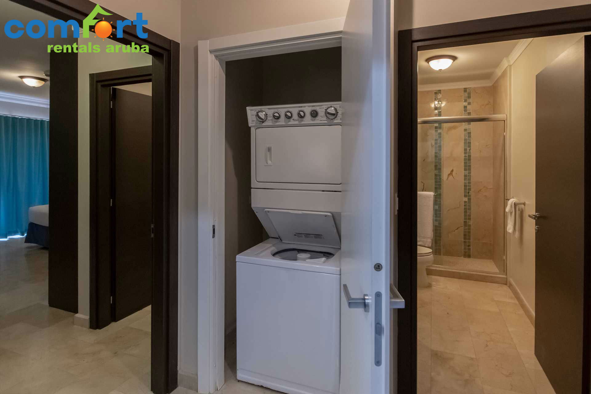 Washer and dryer are conveniently located in the condo