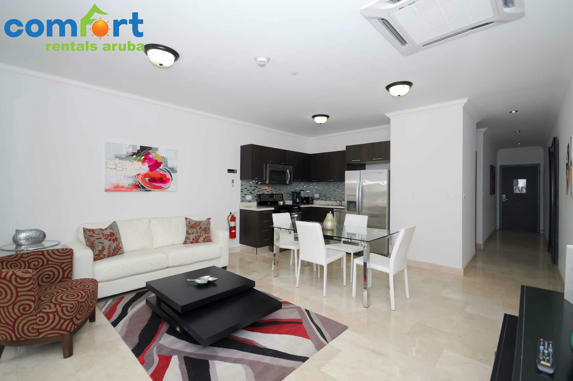 The condo features an open plan living area that will make you feel right at home