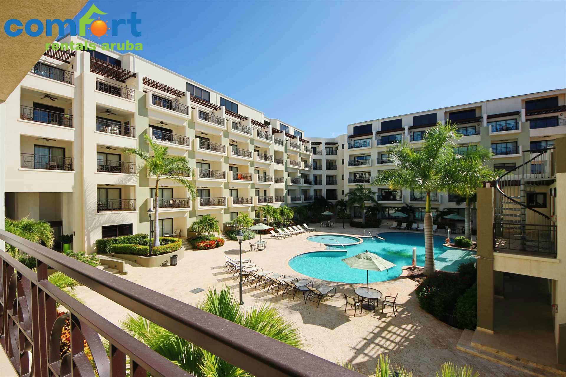 Sit on your balcony and enjoy your amazing pool view!