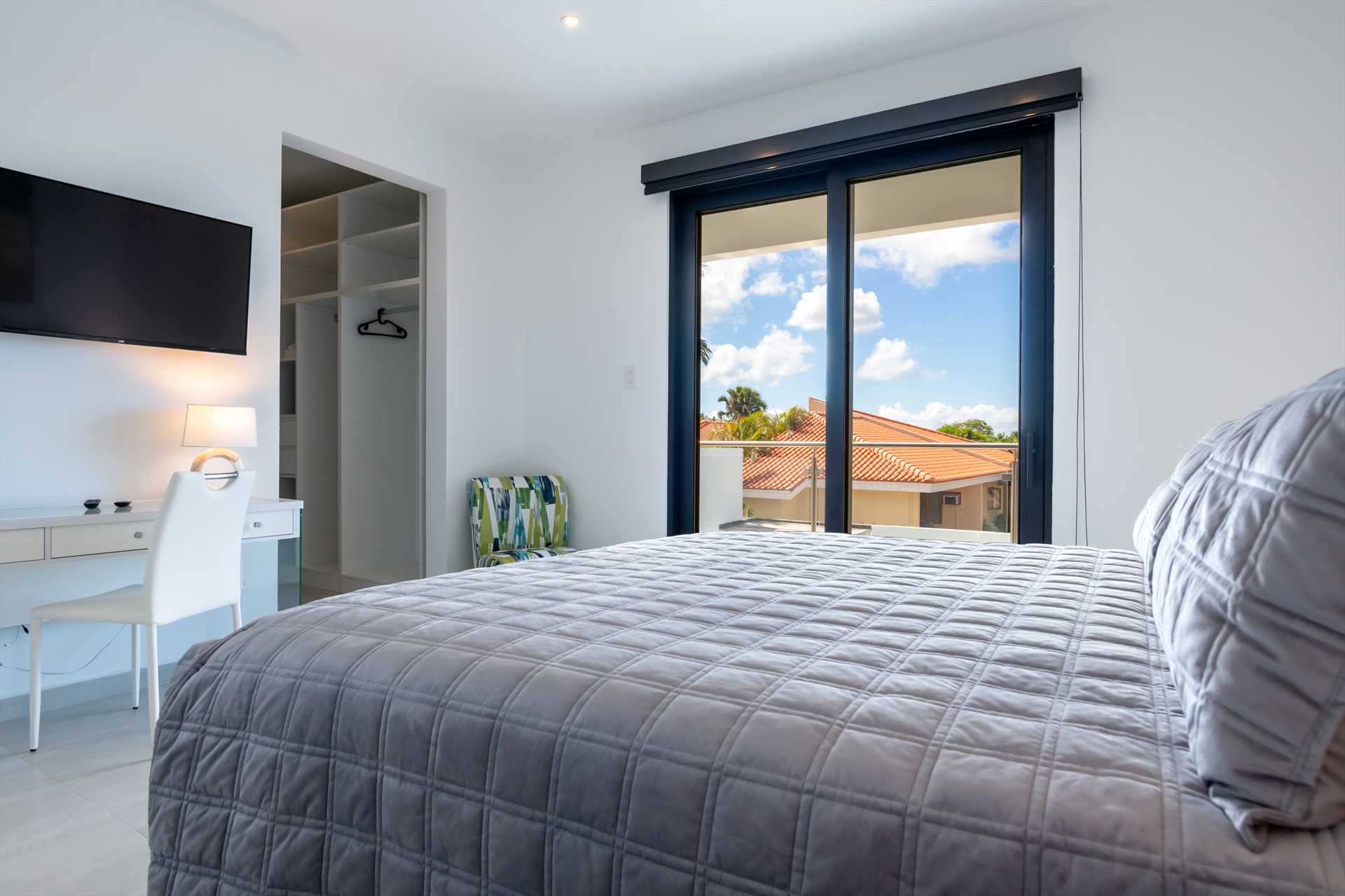 Wake up to breathtaking views from the master bedroom balcony