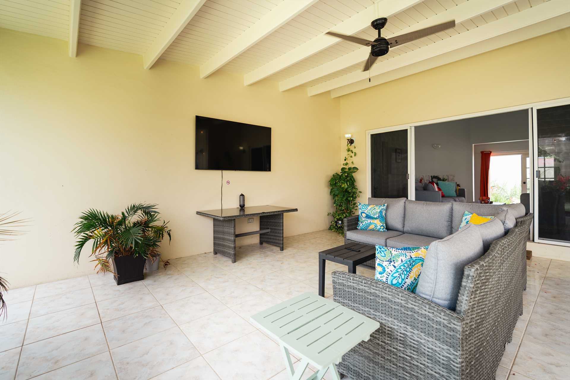 TV and seating area in the veranda